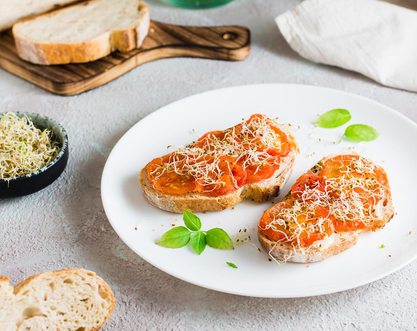 appetizing-sandwich-with-sun-dried-tomatoes-and-alfalfa-sprouts