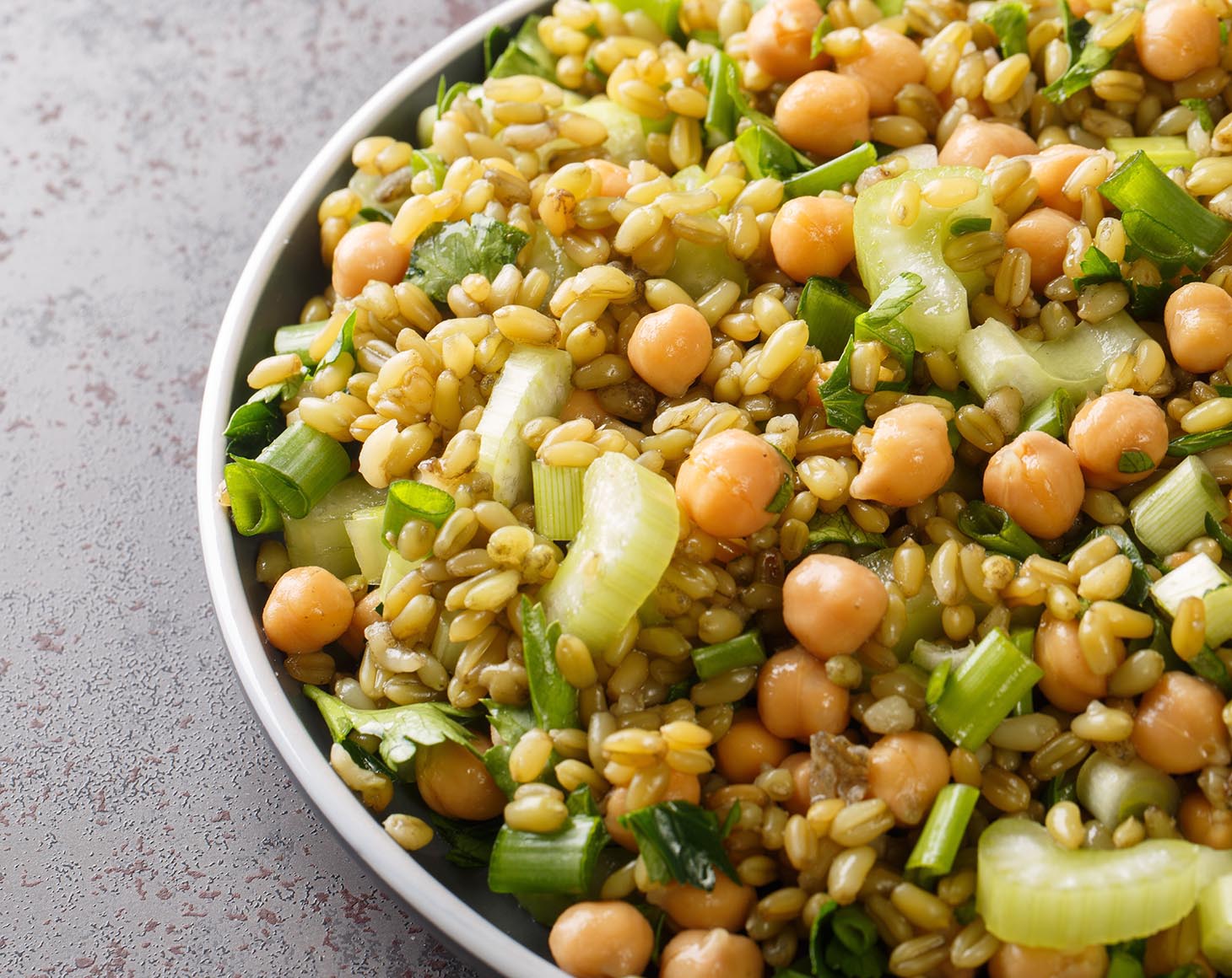 healthy-salad-made-with-organic-whole-freekeh-chickpeas-and-celery