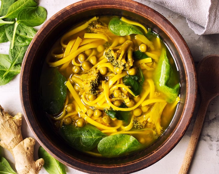 turmeric-noodle-soup-with-organic-green-peas-min