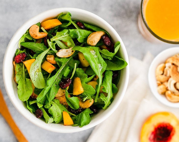 arugula-peaches-salad-with-organic-dry-roasted-cashew-halves-and-pieces-min
