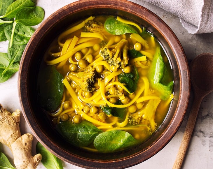 turmeric-noodle-soup-with-organic-whole-green-peas-min